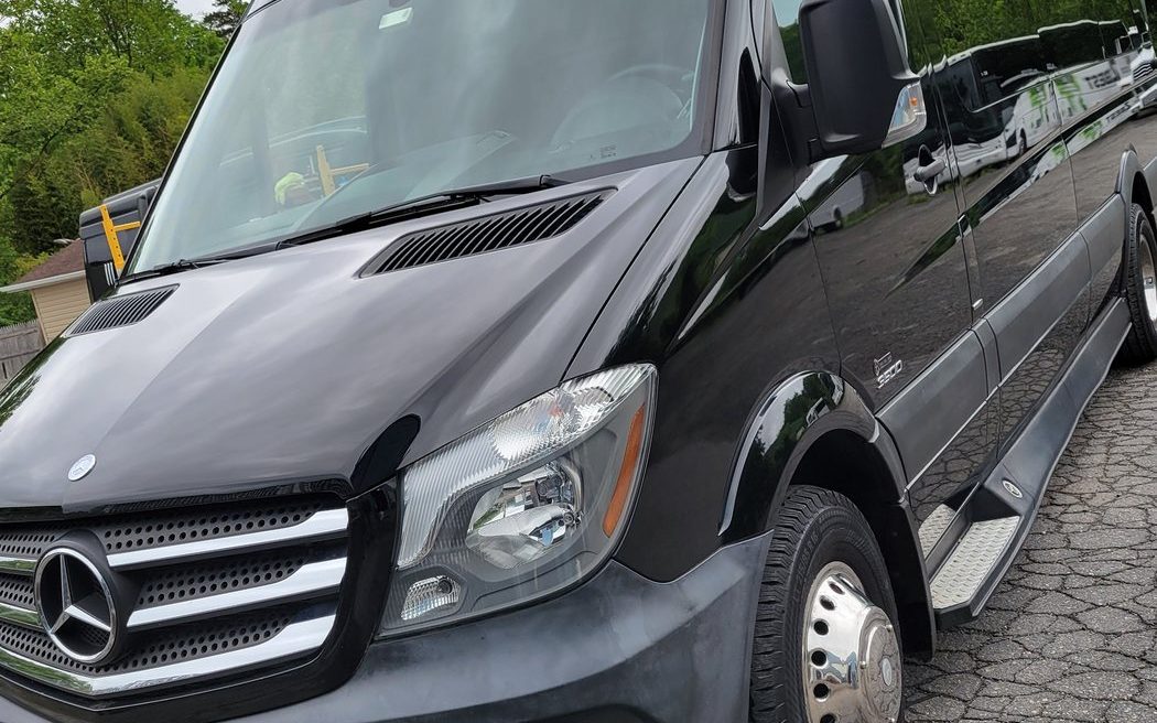 Black service van parked on site for a mobile detailing job